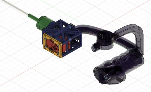 CAD rendering showing the complete instrument, control enclosure, and hand-held mechanism